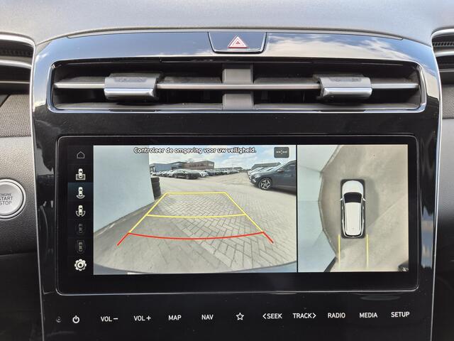 Hyundai TUCSON 1.6 T-GDI 230PK HEV Premium Sky Automaat / 1650kg Trekgewicht / Apple Carplay Android Auto / Adaptief cruise control / Glazen schuif- en kanteldak / Stuur-, en Stoelverwarming / Stoelventilatie /