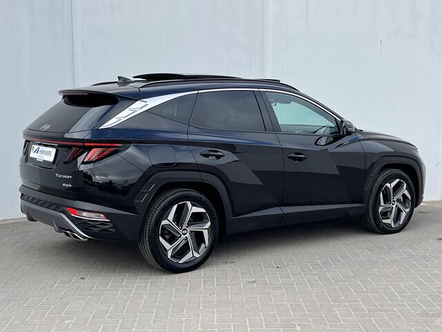 Hyundai TUCSON 1.6 T-GDI PHEV Premium Sky 4WD / 100% Dealer onderhouden / Trekgewicht 1.350 kg / Elektrisch Glazen schuif- en kanteldak / Elektrische achterklep / Camera 360° / Apple Carplay & Android Auto / Stuur- en stoelverwarming voor en achter / Stoelverkoeling / K