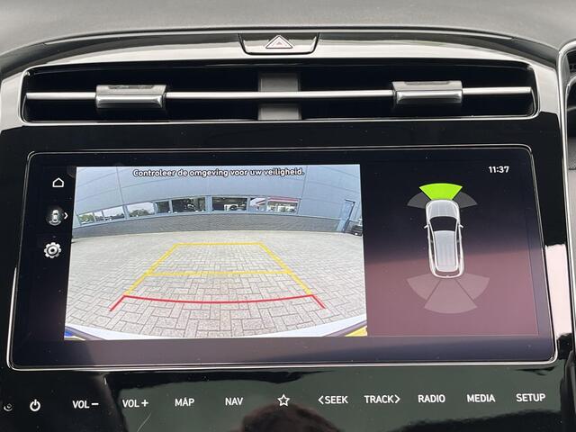 Hyundai TUCSON 1.6 T-GDI HEV 230pk Premium Sky Automaat / Trekgewicht 1.650 kg / Elektrisch Glazen schuif- en kanteldak / Elektrische achterklep / Achteruitrij camera / Apple Carplay & Android Auto / Stuur- en stoelverwarming voor en achter / Stoelverkoeling / Krell Sou