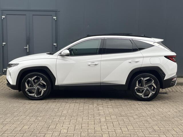 Hyundai TUCSON 1.6 T-GDI HEV 230pk Premium Sky Automaat / Trekgewicht 1.650 kg / Elektrisch Glazen schuif- en kanteldak / Elektrische achterklep / Achteruitrij camera / Apple Carplay & Android Auto / Stuur- en stoelverwarming voor en achter / Stoelverkoeling / Krell Sou