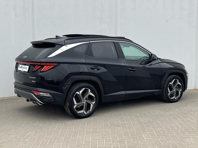 Hyundai TUCSON 1.6 T-GDI PHEV Premium Sky 4WD Automaat / Trekgewicht 1.350 kg / Elektrisch Glazen schuif- en kanteldak / Elektrische achterklep / Camera 360° / Apple Carplay & Android Auto / Stuur- en stoelverwarming voor en achter / Stoelverkoeling / Krell Soundsystem 
