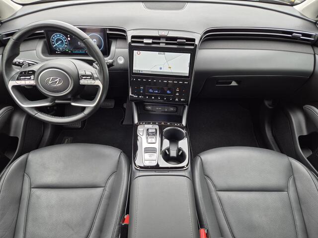 Hyundai TUCSON 1.6 T-GDI HEV 230 pk Premium Sky Automaat / 1650kg Trekgewicht / Glazen schuif- en kanteldak / Stuur- en Stoelverwarming / Adaptief cruise control / Stoelventilatie voor / Rondomzicht camera / Elektrische bedienbare achterklep /