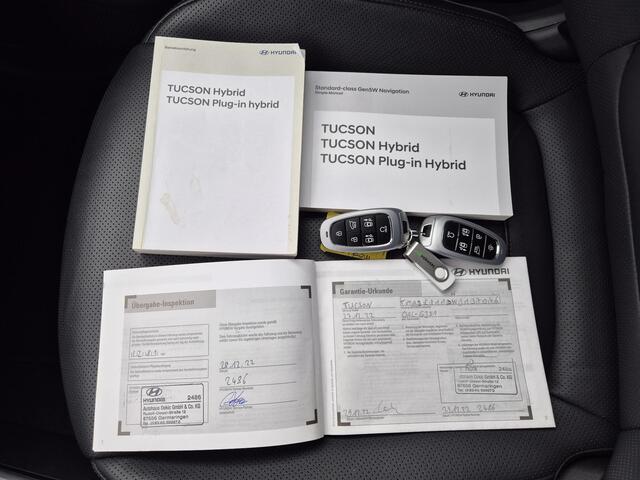 Hyundai TUCSON 1.6 T-GDI HEV 230 pk Premium Sky Automaat / 1650kg Trekgewicht / Glazen schuif- en kanteldak / Stuur- en Stoelverwarming / Adaptief cruise control / Stoelventilatie voor / Rondomzicht camera / Elektrische bedienbare achterklep /