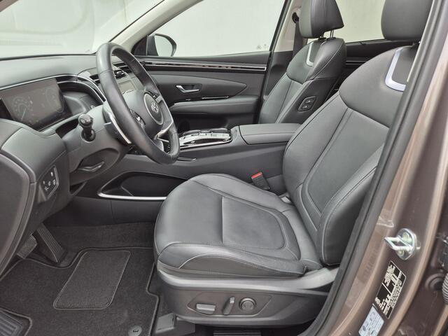 Hyundai TUCSON 1.6 T-GDI HEV 230 pk Premium Sky Automaat / 1650kg Trekgewicht / Glazen schuif- en kanteldak / Stuur- en Stoelverwarming / Adaptief cruise control / Stoelventilatie voor / Rondomzicht camera / Elektrische bedienbare achterklep /