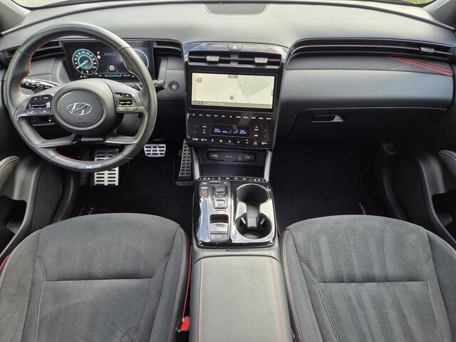 Hyundai TUCSON 1.6 T-GDI PHEV Plug-in N Line Sky 4WD Automaat / Rondomzicht camera / Apple Carplay Android Auto / Glazen schuif- en kanteldak / Trekgewicht 1350 Kg / Stuur- en Stoelverwarming / Elektrisch bedienbare stoelen - achterklep /