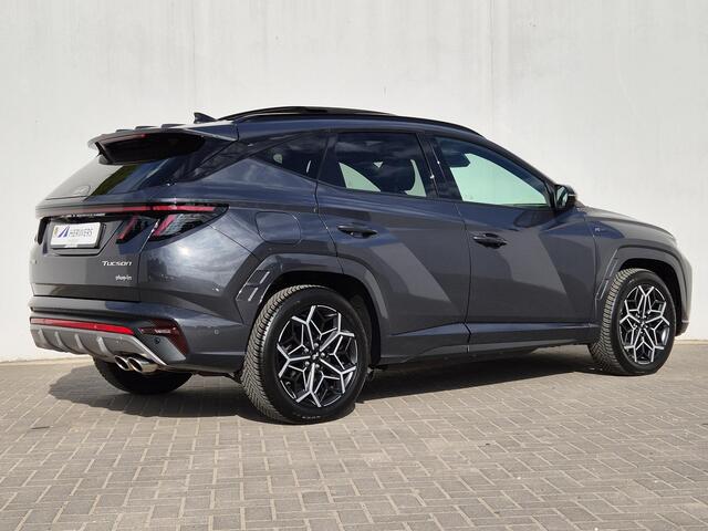 Hyundai TUCSON 1.6 T-GDI PHEV Plug-in N Line Sky 4WD Automaat / Rondomzicht camera / Apple Carplay Android Auto / Glazen schuif- en kanteldak / Trekgewicht 1350 Kg / Stuur- en Stoelverwarming / Elektrisch bedienbare stoelen - achterklep /