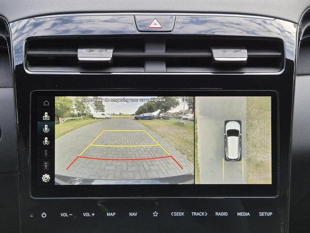 Hyundai TUCSON 1.6 T-GDI PHEV Plug-in N Line Sky 4WD Automaat / Rondomzicht camera / Apple Carplay Android Auto / Glazen schuif- en kanteldak / Trekgewicht 1350 Kg / Stuur- en Stoelverwarming / Elektrisch bedienbare stoelen - achterklep /