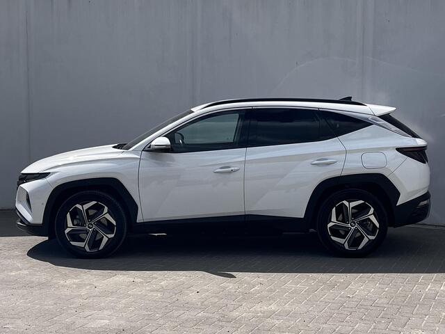 Hyundai TUCSON 1.6 T-GDI PHEV Premium 4WD 265pk automaat / Weinig km / Dealer onderhouden / Accu SoH 100% / Trekgewicht 1.350 kg / Adaptief CC / Lederen Bekleding / 19" LMV / Stuur- en Stoelverwarming / Camera 360° / Stoelventilatie /