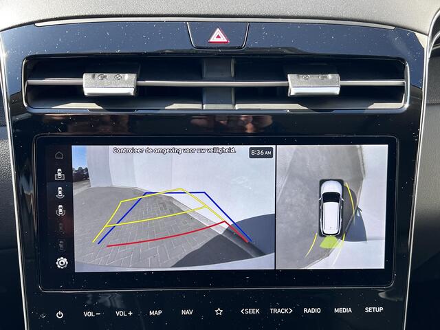 Hyundai TUCSON 1.6 T-GDI HEV Premium Sky automaat / Weinig km / Dealer onderhouden / Trekgewicht 1.650 kg / Pano schuifdak / Elektr. stoelen en klep / Stuur-, stoel- en achterbankverwarming / Stoelventilatie /