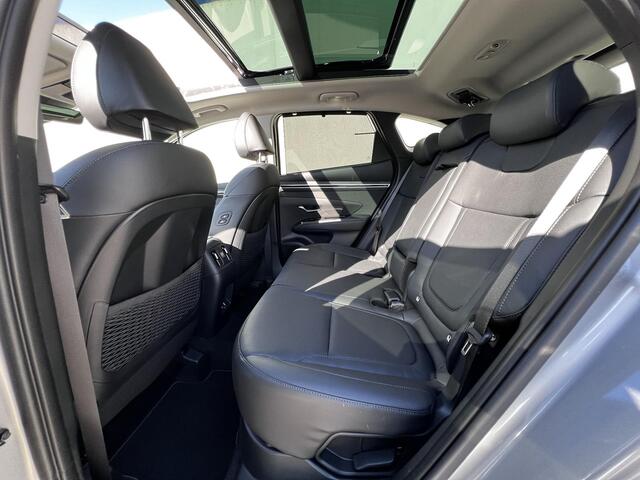 Hyundai TUCSON 1.6 T-GDI HEV Premium Sky automaat / Weinig km / Dealer onderhouden / Trekgewicht 1.650 kg / Pano schuifdak / Elektr. stoelen en klep / Stuur-, stoel- en achterbankverwarming / Stoelventilatie /