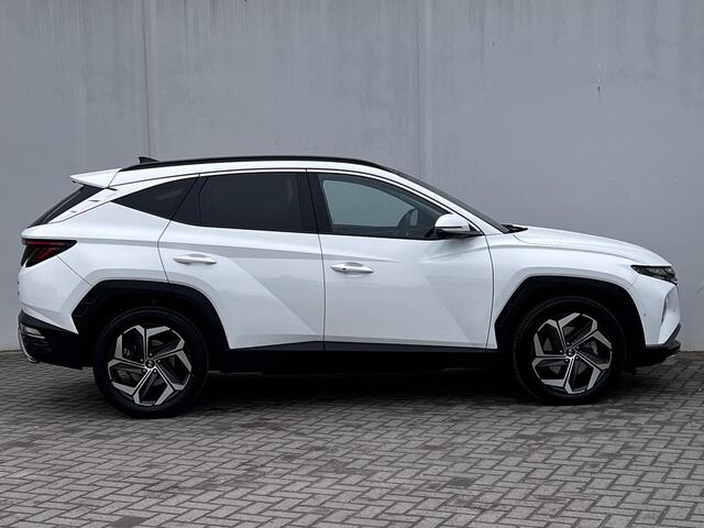 Hyundai TUCSON 1.6 T-GDI HEV 230pk Premium Sky Automaat / Trekgewicht 1.650 kg / Glazen schuif-kanteldak / Leder / Stuur-, stoel- & achterbankverwarming / Stoelventilatie /