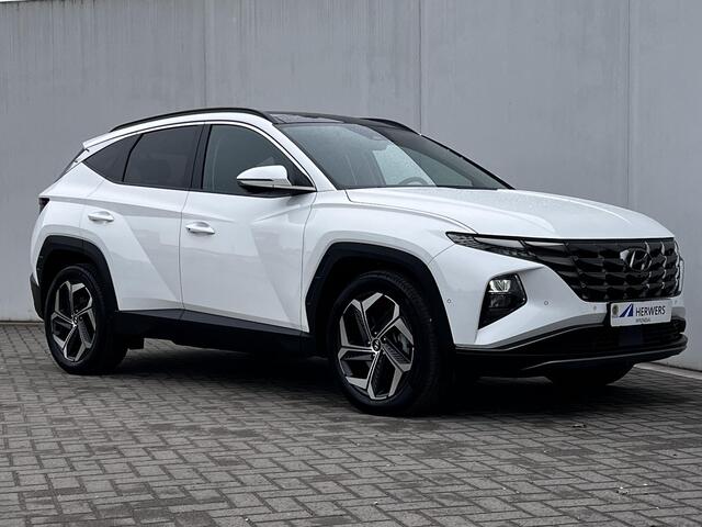 Hyundai TUCSON 1.6 T-GDI HEV 230pk Premium Sky Automaat / Trekgewicht 1.650 kg / Glazen schuif-kanteldak / Leder / Stuur-, stoel- & achterbankverwarming / Stoelventilatie /