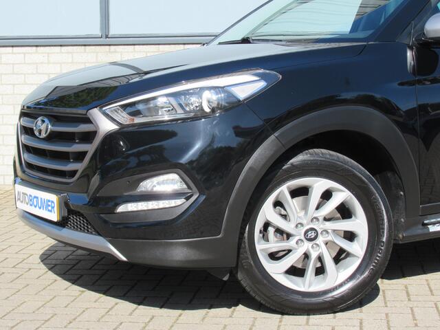 Hyundai TUCSON 1.6 GDi Go! 2e eigen | dealer onderh | sidesteps | navi | cruise | camera