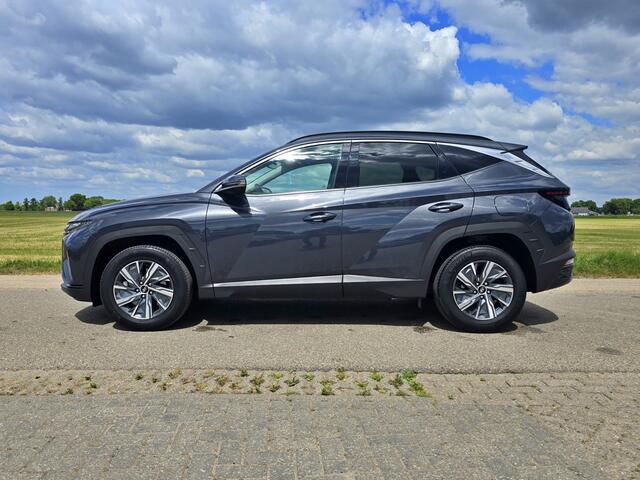 Hyundai TUCSON 1.6 T-GDI HEV Comfort Smart - 180 Pk - Euro 6 - ParkeerCamera - StoelVerwarming