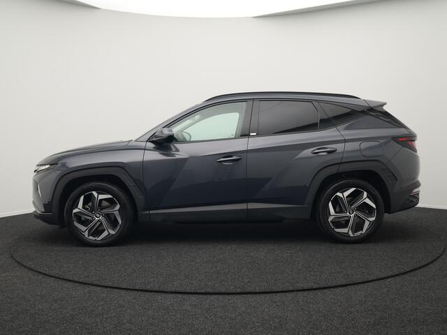 Hyundai TUCSON 1.6 T-GDI Comfort 4WD 265pk Plug In Hybrid Dealer O.H. PHEV | Sportstoelen Verwarmd | Navigatie | Camera | Apple Carplay | DAB | L.M. 19" | Climate Control | Virtual |