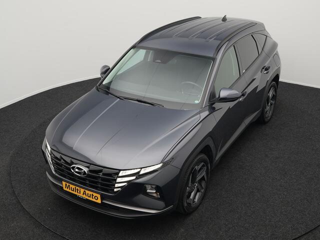Hyundai TUCSON 1.6 T-GDI Comfort 4WD 265pk Plug In Hybrid Dealer O.H. PHEV | Sportstoelen Verwarmd | Navigatie | Camera | Apple Carplay | DAB | L.M. 19" | Climate Control | Virtual |