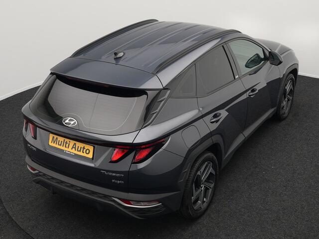 Hyundai TUCSON 1.6 T-GDI Comfort 4WD 265pk Plug In Hybrid Dealer O.H. PHEV | Sportstoelen Verwarmd | Navigatie | Camera | Apple Carplay | DAB | L.M. 19" | Climate Control | Virtual |