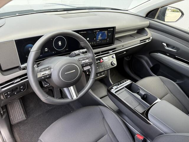 Hyundai TUCSON 1.6 T-GDI PHEV Comfort Smart / Navigatie / Airco / Cruise Control / Lederen/stof bekleding / Stoel en Stuurverwarming /