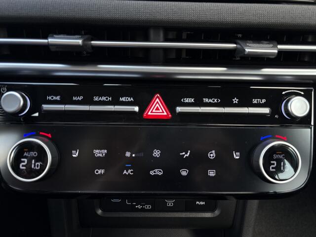 Hyundai TUCSON 1.6 T-GDI PHEV Comfort Smart / Navigatie / Airco / Cruise Control / Lederen/stof bekleding / Stoel en Stuurverwarming /