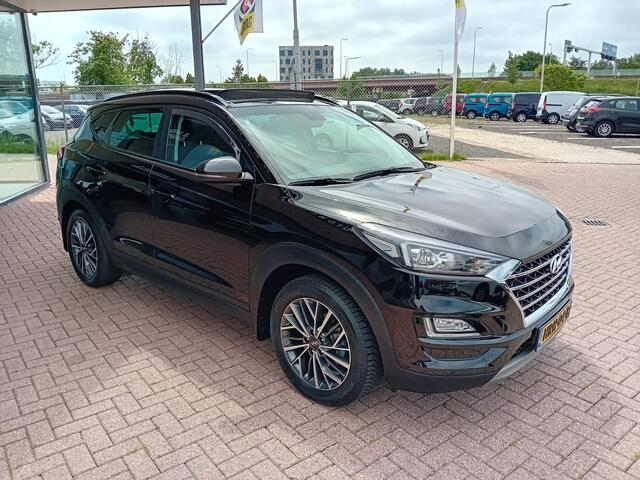 Hyundai TUCSON 1.6 T-GDI 4WD Comfort Automaat, Airco(Automatisch), Carplay/Android auto, Navigatie, Panorama schuifdak, Stoelverwarming, Stuurwiel verwarmd, Parkeersensoren, Camera, Elektrische ramen en spiegels, Goed onderhouden nette auto, BOVAG