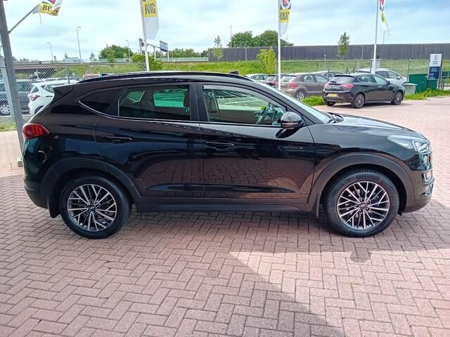 Hyundai TUCSON 1.6 T-GDI 4WD Comfort Automaat, Airco(Automatisch), Carplay/Android auto, Navigatie, Panorama schuifdak, Stoelverwarming, Stuurwiel verwarmd, Parkeersensoren, Camera, Elektrische ramen en spiegels, Goed onderhouden nette auto, BOVAG
