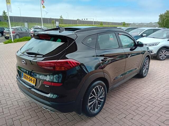 Hyundai TUCSON 1.6 T-GDI 4WD Comfort Automaat, Airco(Automatisch), Carplay/Android auto, Navigatie, Panorama schuifdak, Stoelverwarming, Stuurwiel verwarmd, Parkeersensoren, Camera, Elektrische ramen en spiegels, Goed onderhouden nette auto, BOVAG
