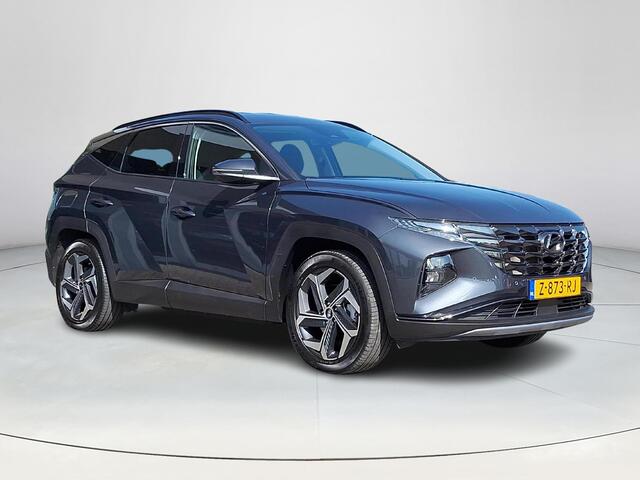 Hyundai TUCSON 1.6 T-GDI PHEV Comfort Smart 4WD | Achteruitrijcamera | Apple Carplay/Android Auto | Stoel/stuurverwarming | Krell Audio systeem | Elektrische achterklep |