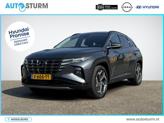 Hyundai TUCSON 1.6 T-GDI PHEV Premium 4WD | Vol-Leder | Digitaal Instrumentenpaneel | Adapt. Cruise Control | Apple Carplay/Android Auto | Stoelverwarming | Dodehoek Detectie | 360° Camera | Rijklaarprijs!