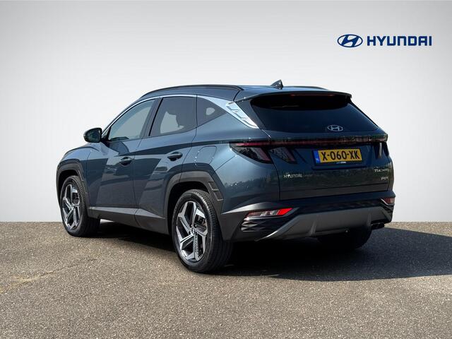 Hyundai TUCSON 1.6 T-GDI PHEV Premium 4WD | Vol-Leder | Digitaal Instrumentenpaneel | Adapt. Cruise Control | Apple Carplay/Android Auto | Stoelverwarming | Dodehoek Detectie | 360° Camera | Rijklaarprijs!