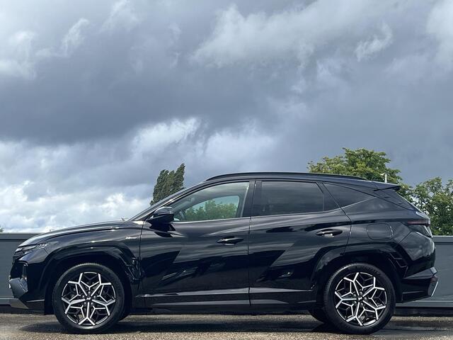 Hyundai TUCSON 1.6 T-GDI HEV 230 PK N Line | 1650 kg trekvermogen | Geïntegreerde navigatiesysteem | Stoelverwarming | Android Auto & Apple Carplay | 19'' Lichtmetalen velgen |