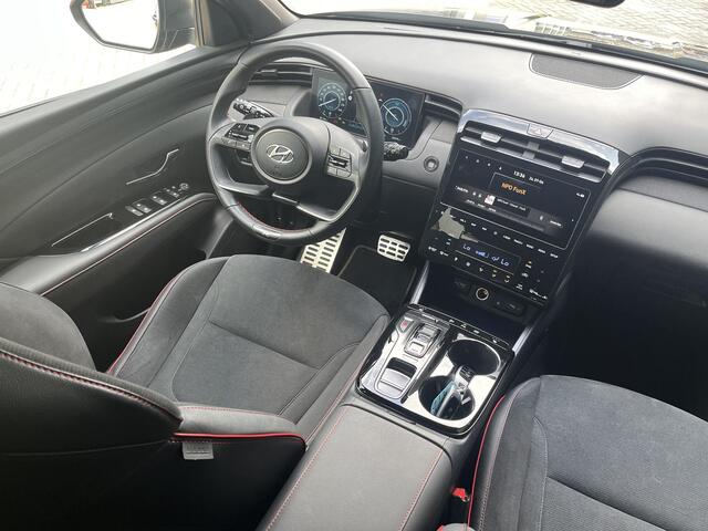 Hyundai TUCSON 1.6 T-GDI HEV 230 PK N Line | 1650 kg trekvermogen | Geïntegreerde navigatiesysteem | Stoelverwarming | Android Auto & Apple Carplay | 19'' Lichtmetalen velgen |