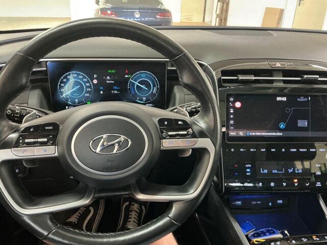 Hyundai TUCSON 1.6 T-GDI PHEV Premium Sky 4WD | Panoramadak | Afneembare trekhaak | 4WD | Stoelverwarming | Stoelventilatie | Lederen bekleding | Elektrische achterklep | KRELL | All season banden