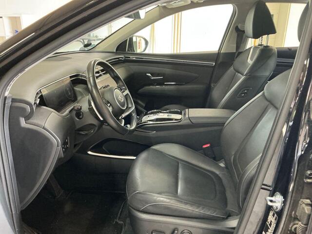 Hyundai TUCSON 1.6 T-GDI PHEV Premium Sky 4WD | Panoramadak | Afneembare trekhaak | 4WD | Stoelverwarming | Stoelventilatie | Lederen bekleding | Elektrische achterklep | KRELL | All season banden