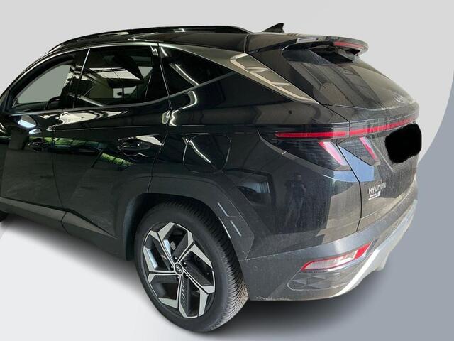 Hyundai TUCSON 1.6 T-GDI PHEV Premium Sky 4WD | Panoramadak | Afneembare trekhaak | 4WD | Stoelverwarming | Stoelventilatie | Lederen bekleding | Elektrische achterklep | KRELL | All season banden