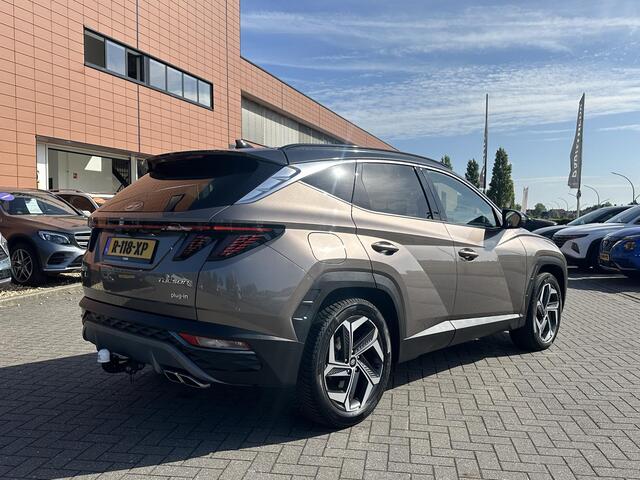 Hyundai TUCSON 1.6 T-GDI PHEV Premium 4WD | Trekhaak | Vol-Leder | Adapt. Cruise Control | Apple Carplay/Android Auto | Stoelverwarming | Dodehoek Detectie | 360° Camera | Rijklaarprijs!