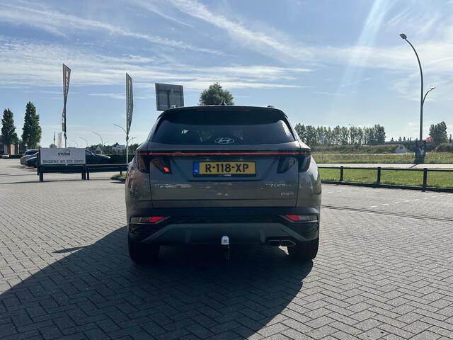 Hyundai TUCSON 1.6 T-GDI PHEV Premium 4WD | Trekhaak | Vol-Leder | Adapt. Cruise Control | Apple Carplay/Android Auto | Stoelverwarming | Dodehoek Detectie | 360° Camera | Rijklaarprijs!