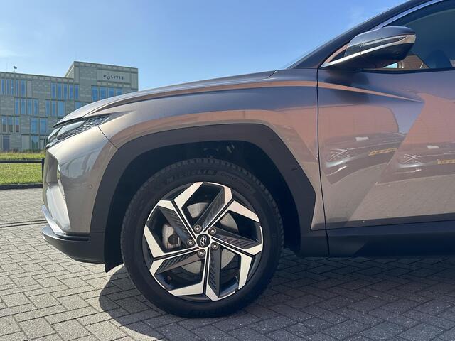 Hyundai TUCSON 1.6 T-GDI PHEV Premium 4WD | Trekhaak | Vol-Leder | Adapt. Cruise Control | Apple Carplay/Android Auto | Stoelverwarming | Dodehoek Detectie | 360° Camera | Rijklaarprijs!