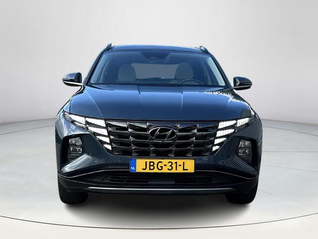 Hyundai TUCSON 1.6 T-GDI HEV Premium Sky | Stoelverwarming/verkoeling | Stuurverwarming | Schuif-kantel dak | Lederen bekleding | 2e zit-rij bankverwarming | 360graden camera | 3-zone klimaatcontrole | Elektrische geheugen stoelen | KRELL- premium audiosysteem |