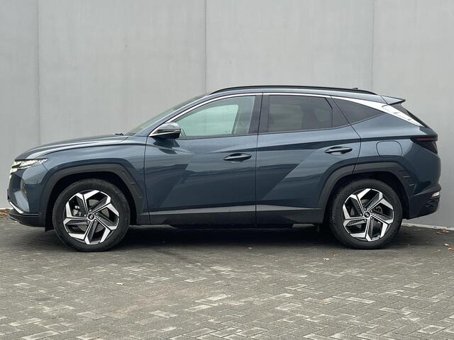 Hyundai TUCSON 1.6 T-GDI PHEV Comfort Smart 4WD / Vaste Trekhaak 13-polig (Trekgewicht 1.350kg) / Achteruitrijcamera / Stuur- en Stoelverwarming / Climate Control / Adaptieve Cruise Control / Apple Carplay & Android Auto / Keyless Entry & Start / Navigatie full map / E
