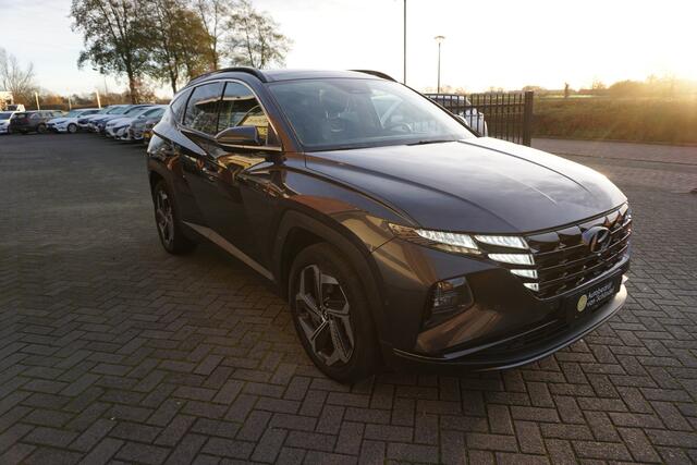 Hyundai TUCSON 1.6 T-GDI HEV PREMIUM SKY VOL LUXE KEURIGE NETTE STAAT 360CAMERA PANORAMADAK AFN.TREKHAAK LEDER STOELKOELING+VERWARMING STUURVERWARMING 19INCH ADAPTIEVE CRUISE ANDROID/APPLECARPLAY NAVI ELECTR.KLEP ELECTR.STOELEN+MEMORY ENZ...