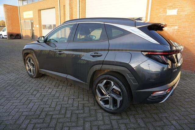 Hyundai TUCSON 1.6 T-GDI HEV PREMIUM SKY VOL LUXE KEURIGE NETTE STAAT 360CAMERA PANORAMADAK AFN.TREKHAAK LEDER STOELKOELING+VERWARMING STUURVERWARMING 19INCH ADAPTIEVE CRUISE ANDROID/APPLECARPLAY NAVI ELECTR.KLEP ELECTR.STOELEN+MEMORY ENZ...