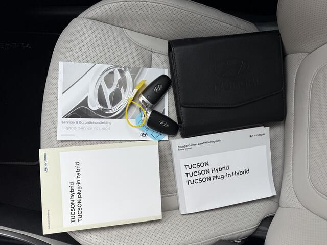 Hyundai TUCSON 1.6 T-GDI PHEV Premium Sky 4WD / Glazen Schuif Kantel Dak / Stoelventilatie / Stoelverwarming / Stuurwiel Verwarming / Memory Seats