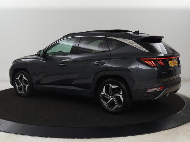 Hyundai TUCSON 1.6 T-GDI PHEV Premium Sky 4WD | Panoramadak | Stoelverntilatie | Leder | 360 Camera | Adaptive cruise | Memory | Achterbankverwarming | Carplay | Full LED | Navigatie | Plug In
