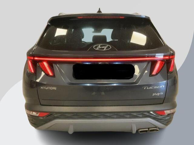 Hyundai TUCSON 1.6 T-GDI PHEV Premium 4WD | Leder | Stoelverwarming/koeling | Navigatie | Camera | Adaptive cruise control