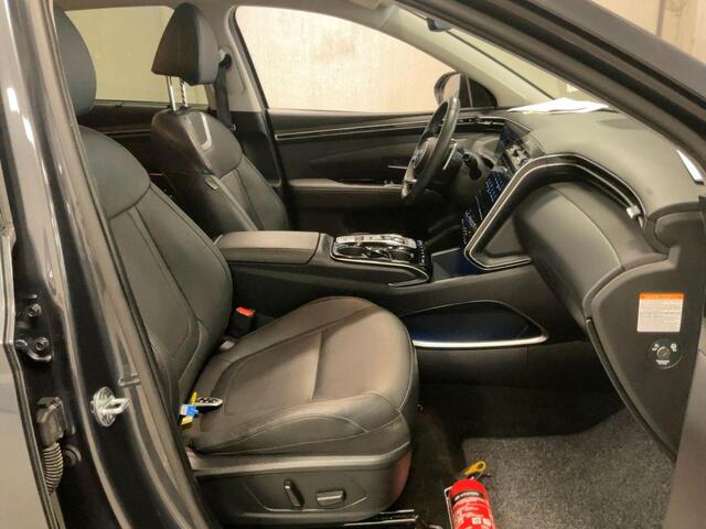 Hyundai TUCSON 1.6 T-GDI PHEV Premium 4WD | Leder | Stoelverwarming/koeling | Navigatie | Camera | Adaptive cruise control
