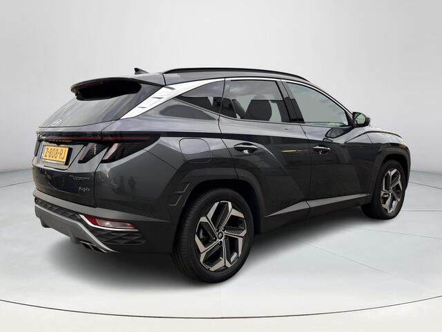 Hyundai TUCSON 1.6 T-GDI PHEV Premium 4WD Lederen bekleding | Stoel- en stuurverwarming | 4WD | Navigatiesysteem | Climate Control | Adaptieve Cruise Control | Plug Inn hybride | Full options | Resterende fabrieksgarantie