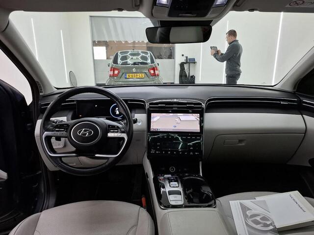 Hyundai TUCSON 1.6 T-GDI HEV PREMIUM SKY I SCHUIF/KANTELDAK I STOELVERWARMING I AUTOMAAT I APPLE CARPLAY I LEDEREN BEKLEDING