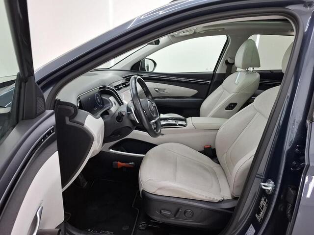 Hyundai TUCSON 1.6 T-GDI HEV PREMIUM SKY I SCHUIF/KANTELDAK I STOELVERWARMING I AUTOMAAT I APPLE CARPLAY I LEDEREN BEKLEDING