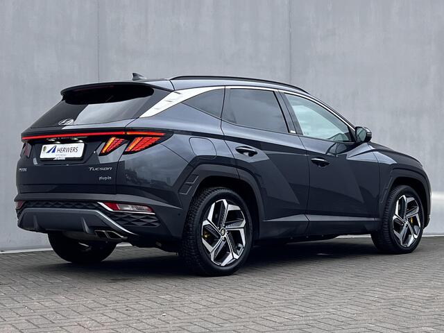 Hyundai TUCSON 1.6 T-GDI PHEV Premium 4WD Automaat / Dealer onderhouden / Navigatie / Stuur-, stoel- en achterbankverwarming /Leder / Stoelventilatie / Elektrische stoelen & klep / Camera 360° / Apple Carplay Android / 19" LM wielen /