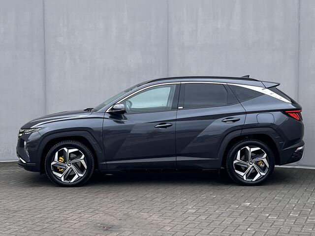 Hyundai TUCSON 1.6 T-GDI PHEV Premium 4WD Automaat / Dealer onderhouden / Navigatie / Stuur-, stoel- en achterbankverwarming /Leder / Stoelventilatie / Elektrische stoelen & klep / Camera 360° / Apple Carplay Android / 19" LM wielen /